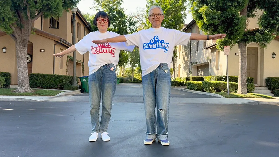 Das Paar Aki und Koichi mit den Schriftzügen 